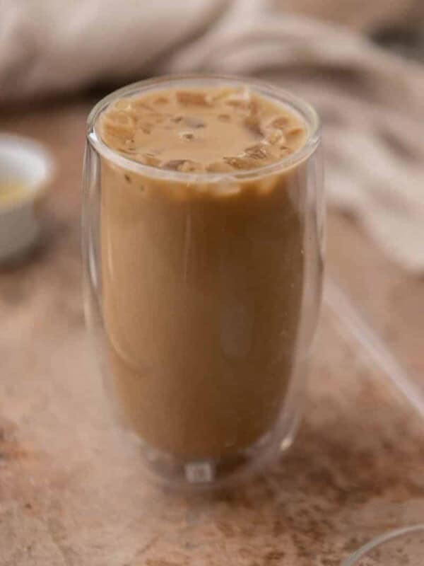 Glass full of caramel iced coffee