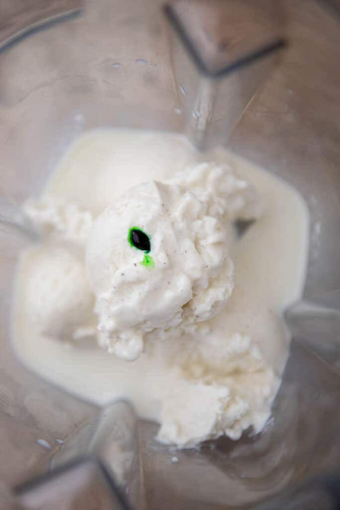 Ice cream and milk in blender