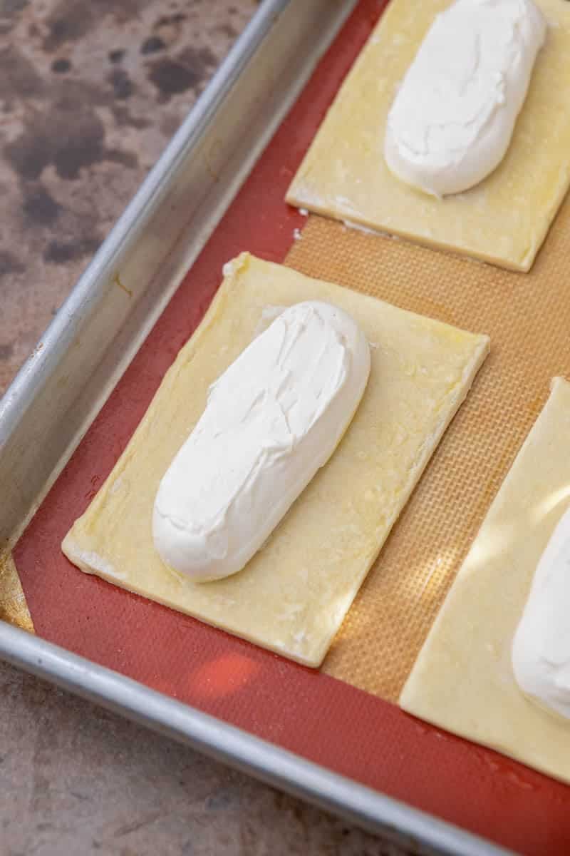 raw cheese danish on baking sheet