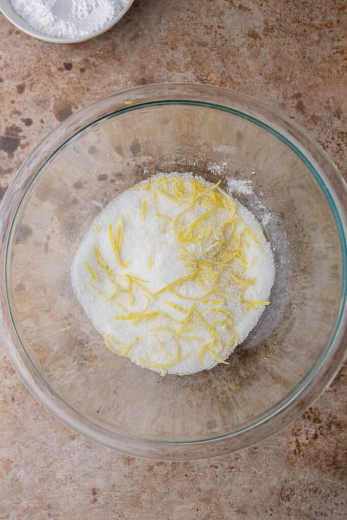Sugar and lemon zest in a bowl