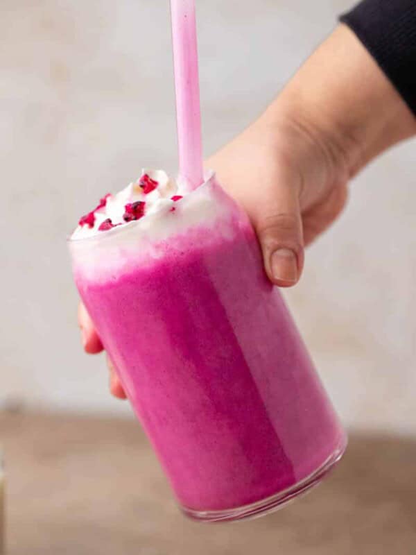 Hand holding starbucks barbie frappuccino
