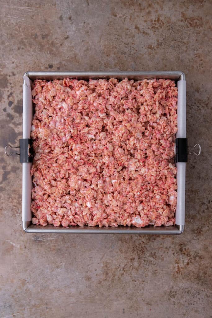Strawberry rice krispy cereal in a pan