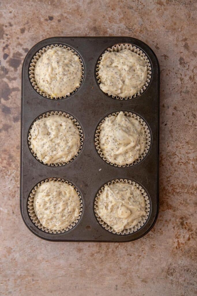Muffin batter in muffin tin