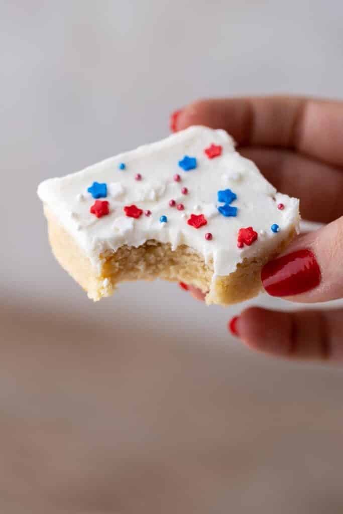 Hand holding patriotic sugar cookies