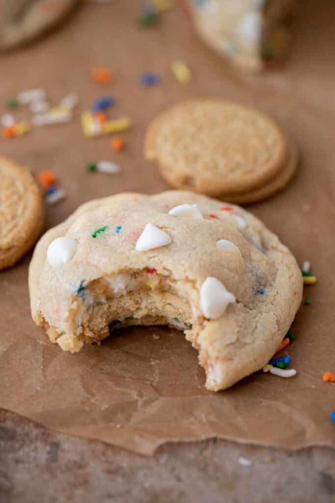 Funfetti Oreo stuffed cookie with a bite taken out of them