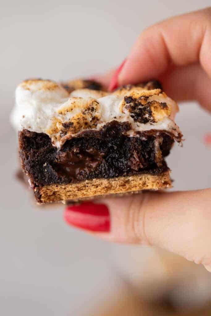 Hand holding lazy girl s'mores brownies