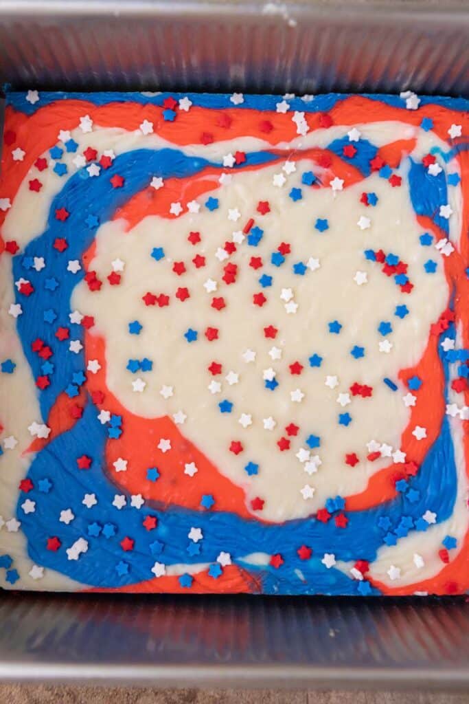 Close up of red white and blue fudge in a pan 