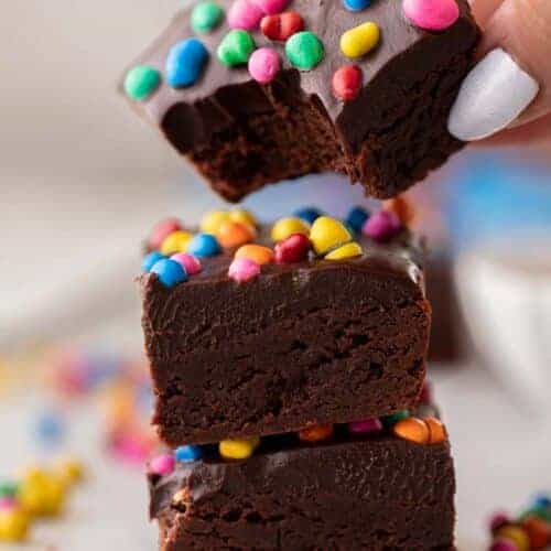 Hand grabbing Small batch cosmic brownies