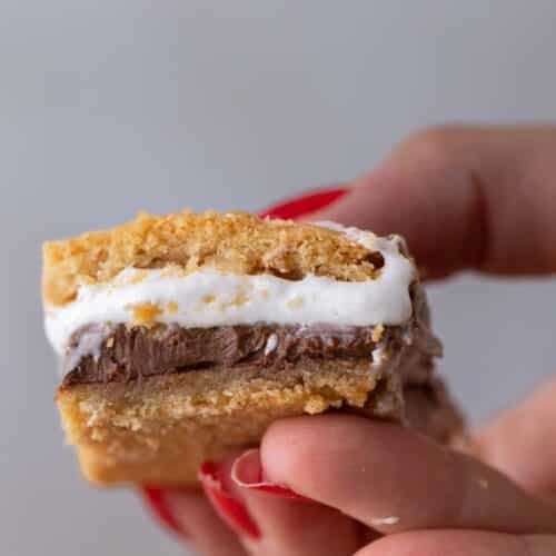 Hand holding s'mores bar cookies