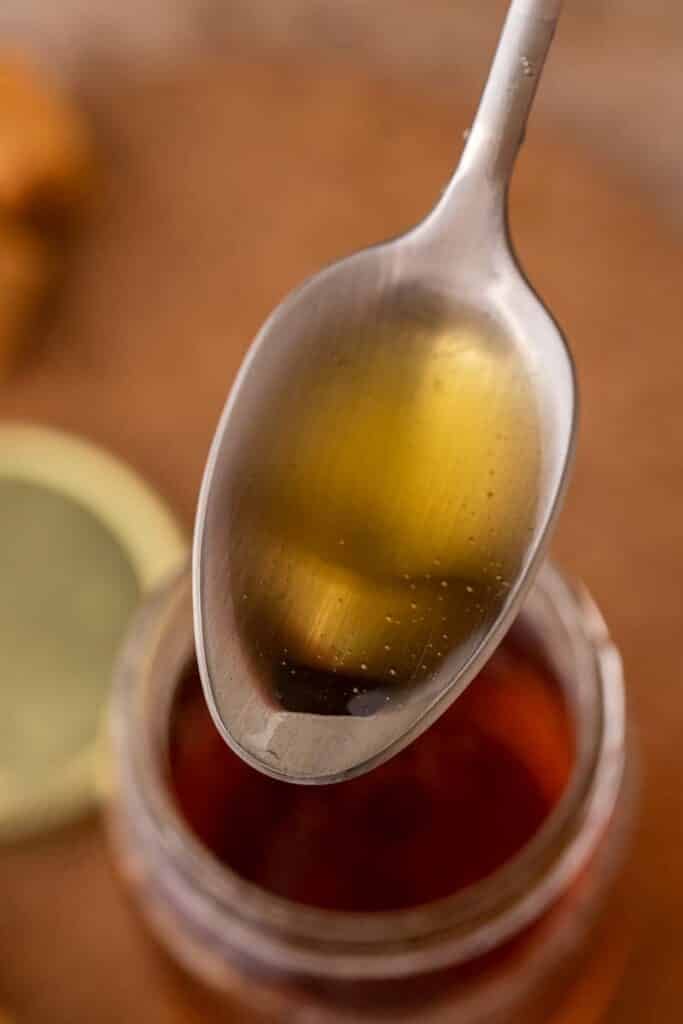 Spoonful of caramel syrup for coffee