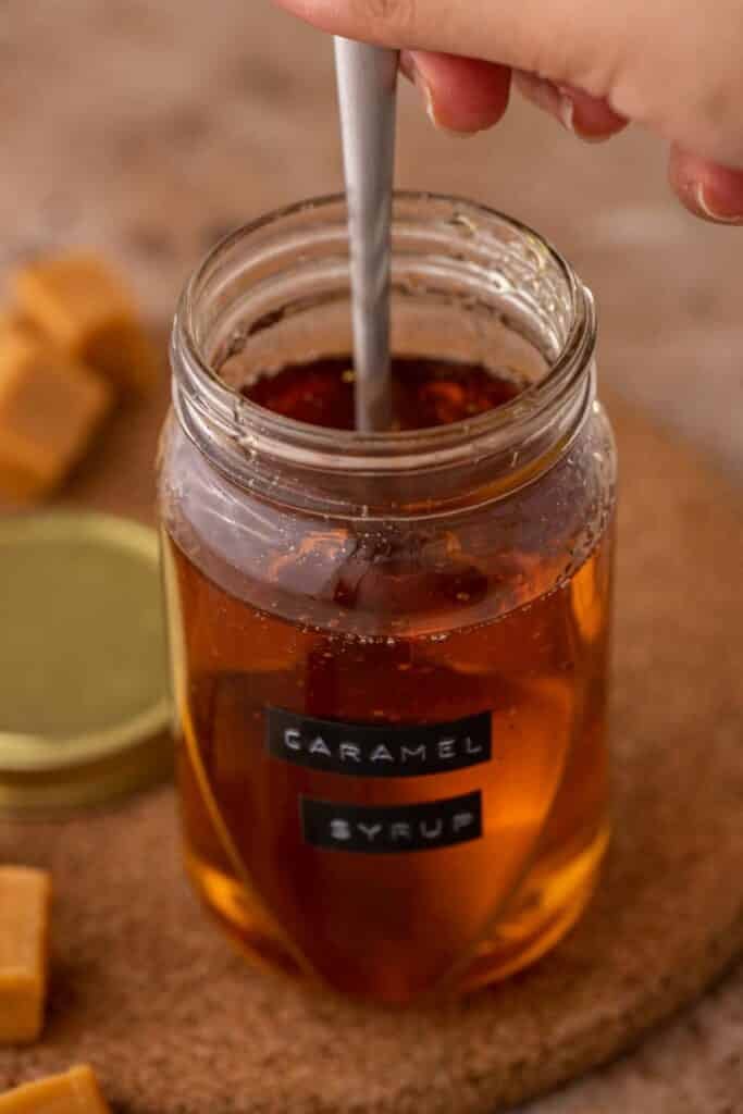 Jar of caramel syrup for coffee