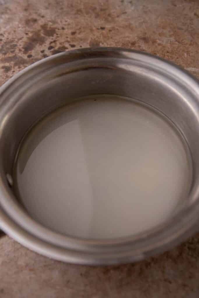 Sugar and water in a pot