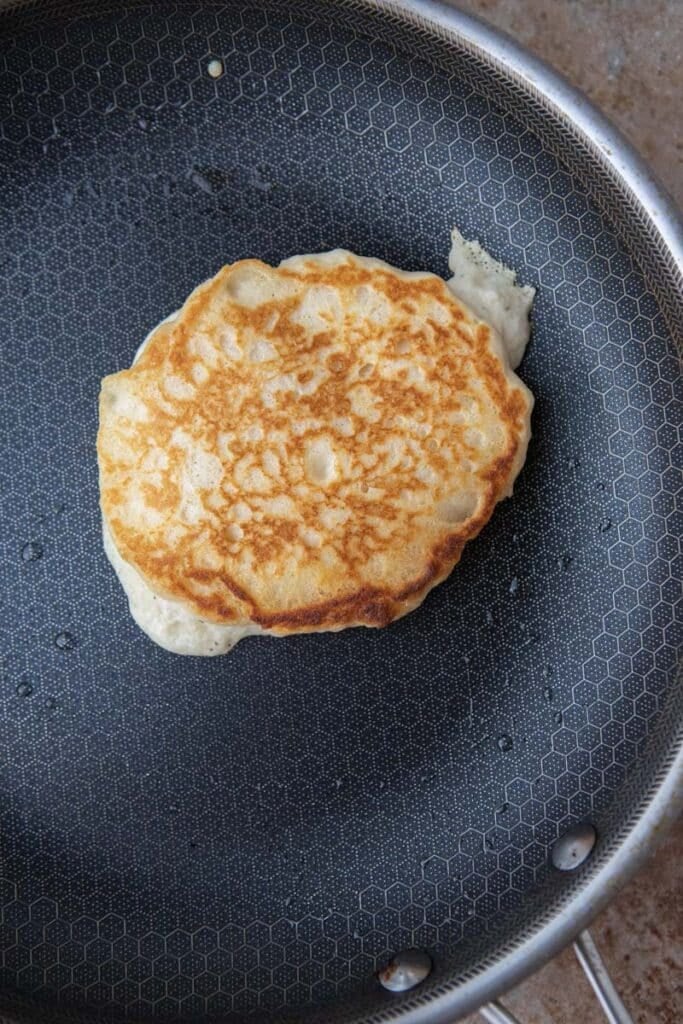 Fluffy pancakes without milk on a pan