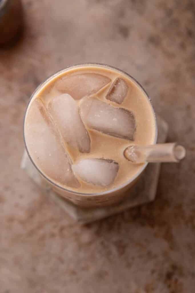 overhead shot of iced mocha coffee in a glass