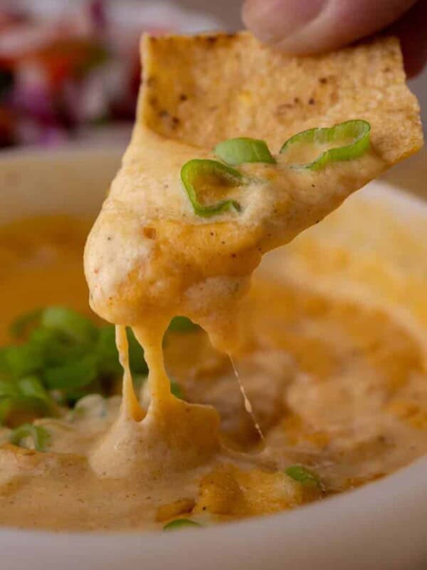 Chip scooping cottage cheese queso