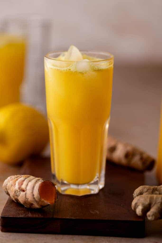 ginger turmeric tonic in a glass