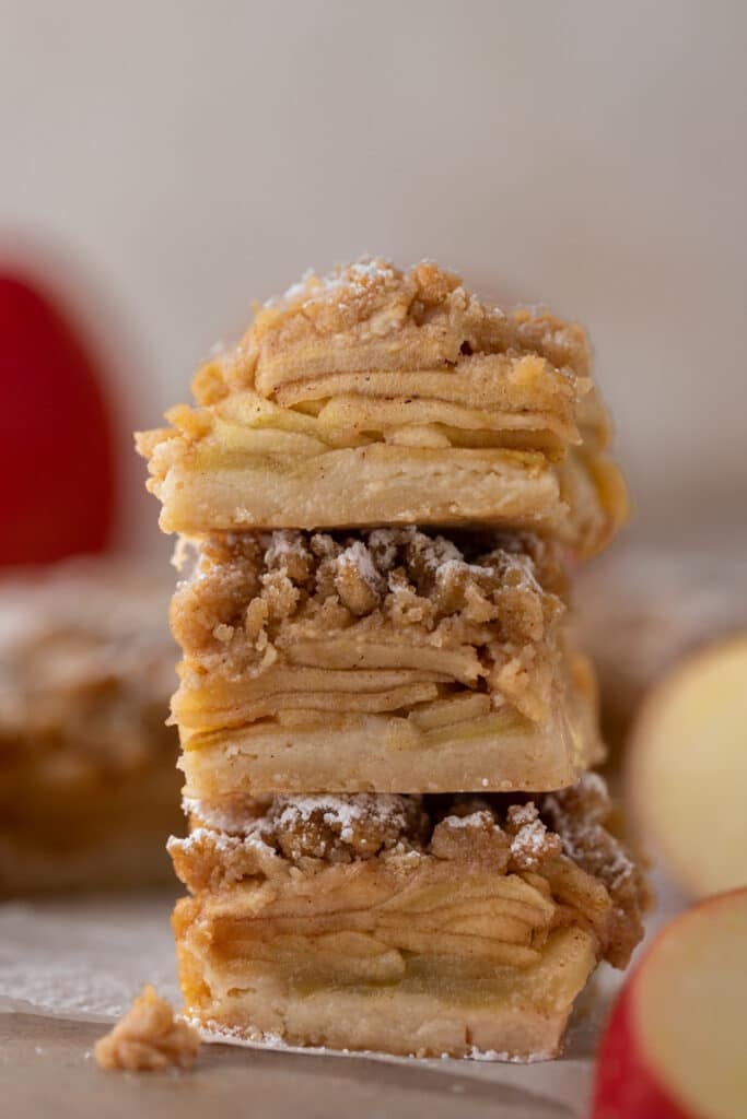 three apple pie bars stacked on top of each other
