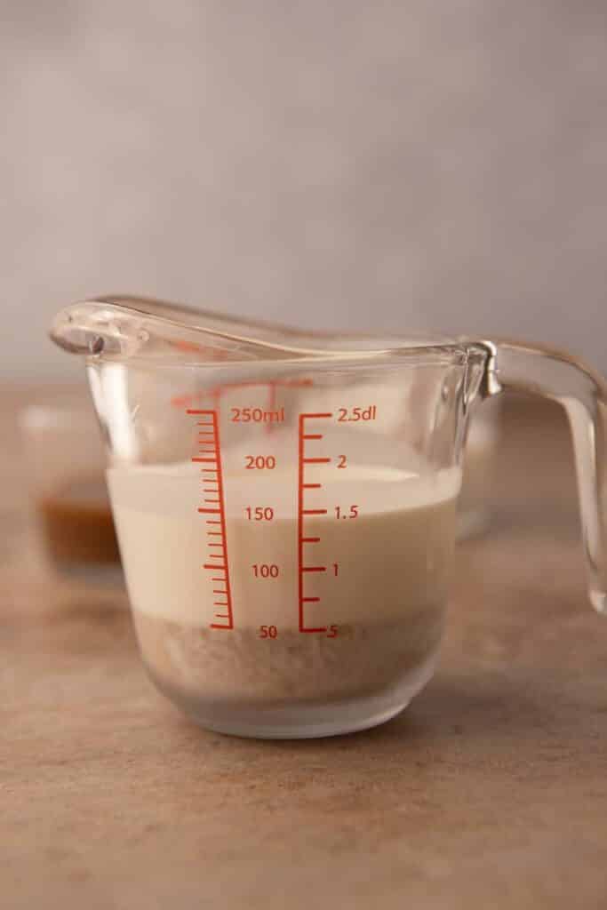 Pumpkin cold foam ingredients in a cup