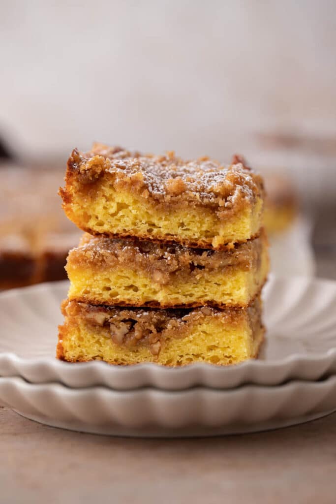 three squares of coffee cake stacked on top of each other