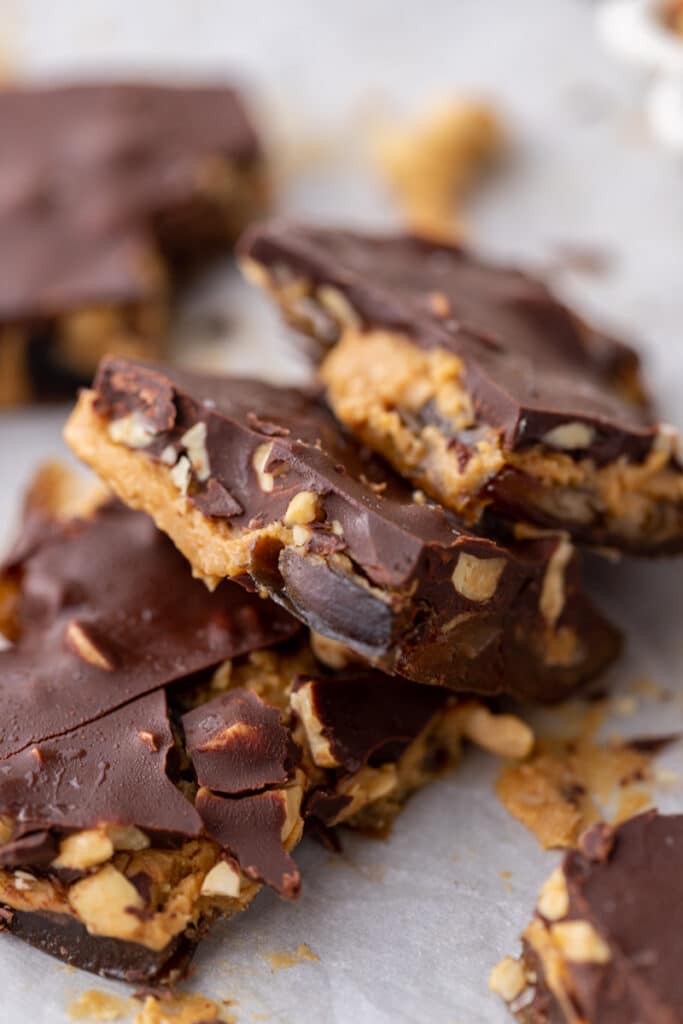 Chopped up date bark with peanut butter and chocolate