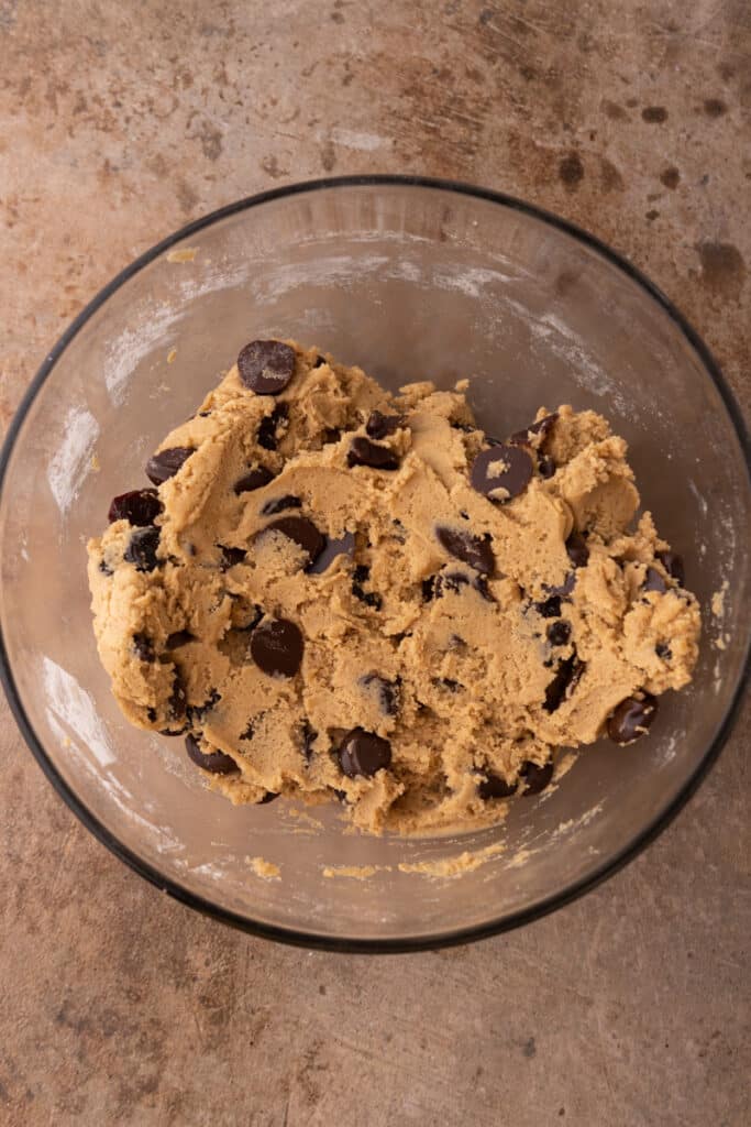 raw cookie dough in a glass bowl 