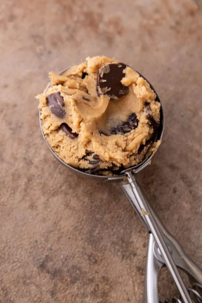 ball of cookie dough in a cookie scoop
