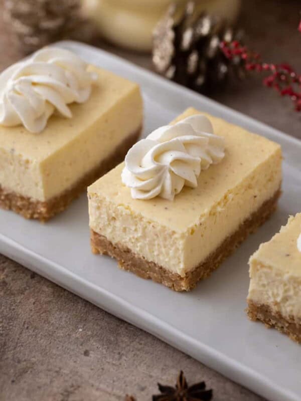 eggnog cheesecake bars on a plate