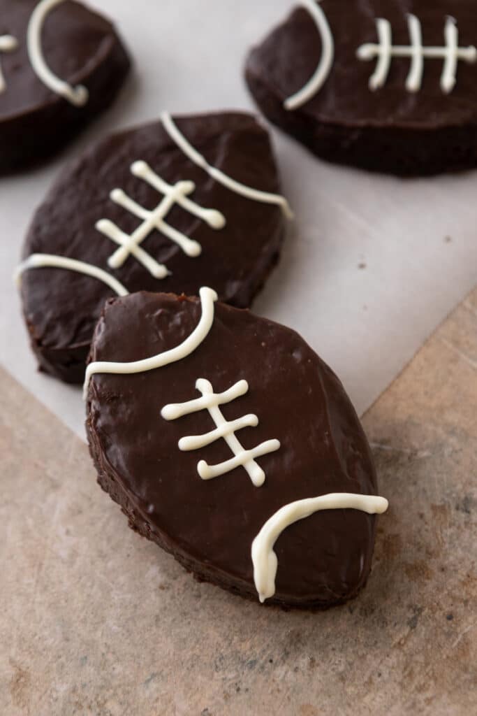 Football brownies with white chocolate design on top