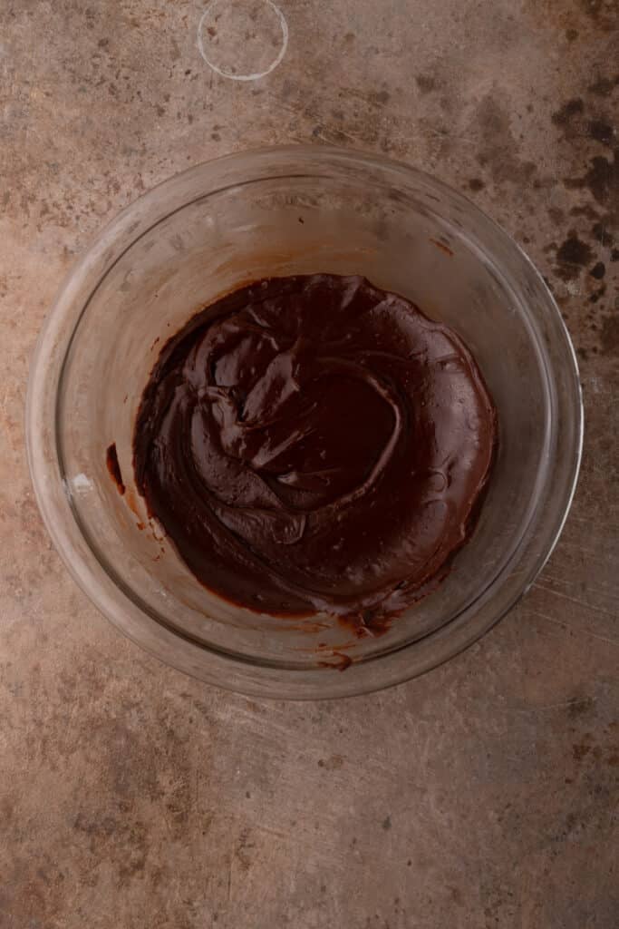 the finished brownie frosting recipe mixture in the bowl