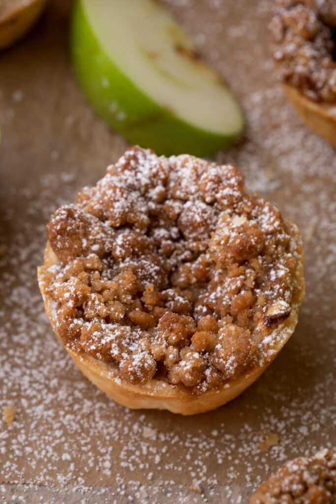 close up shot of a single mini apple pie