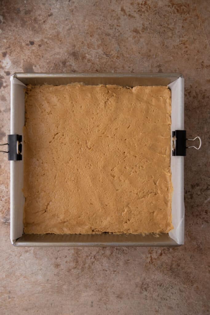 the peanut butter layer pressed into the pan