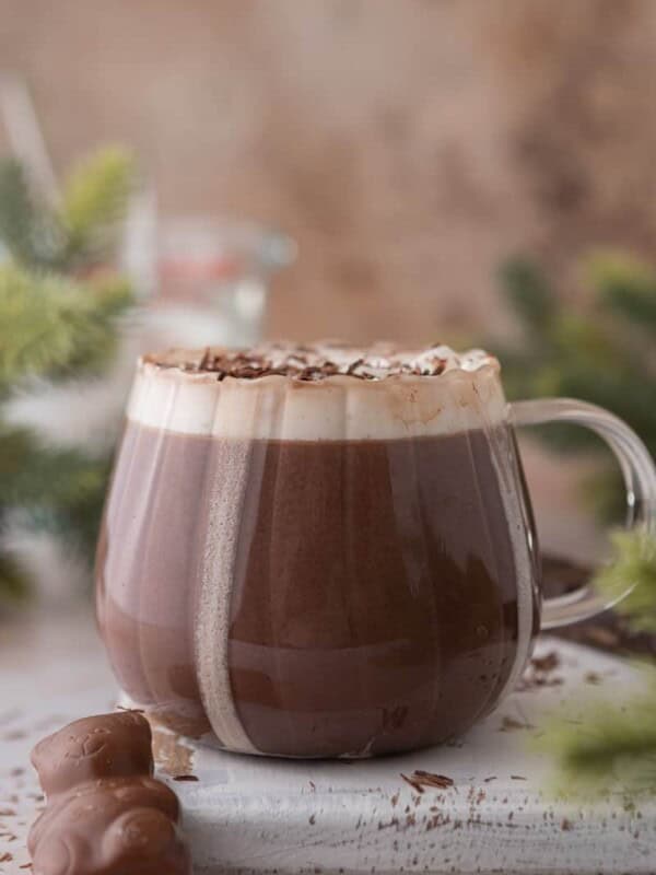 side shot of a hot chocolate for one in a glass