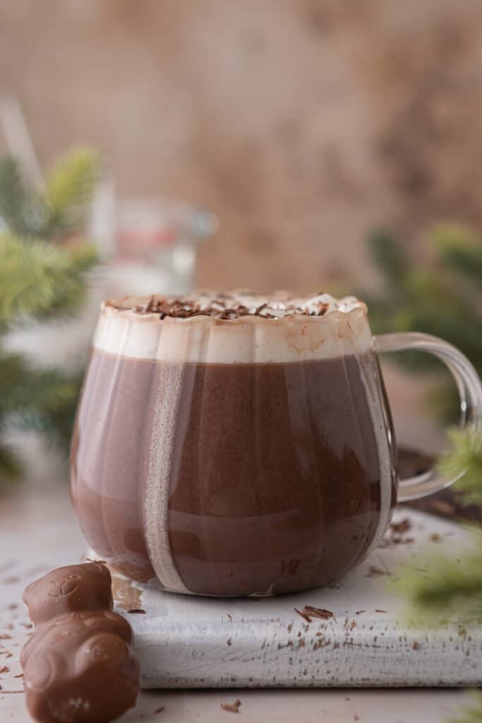 side shot of a hot chocolate for one in a glass