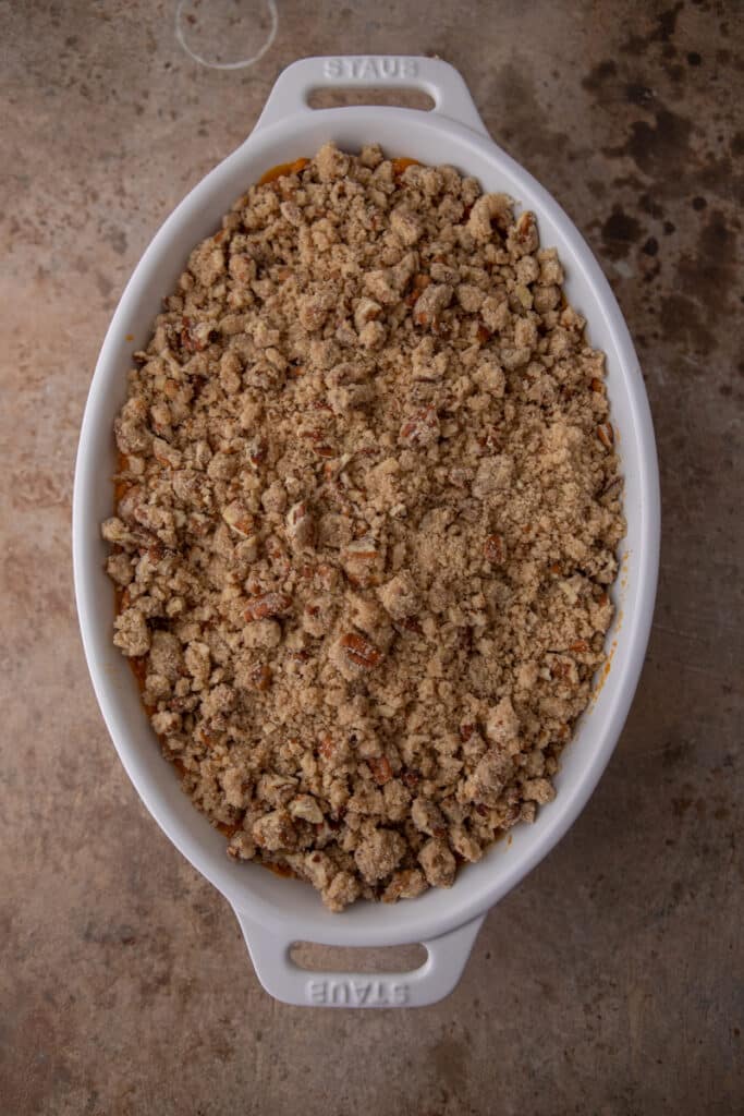 a fully completed sweet potato casserole with pecan topping