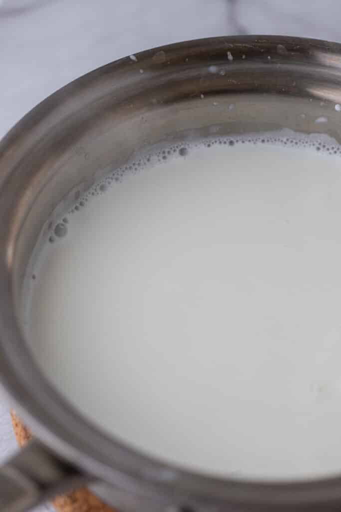 Hot milk in a pot