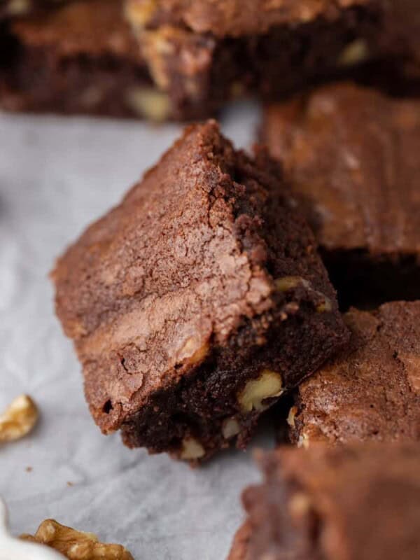 a fudge walnut brownie leaning on another