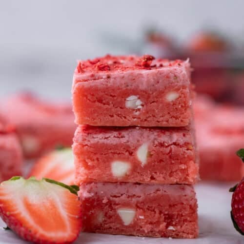 three strawberry brownies stacked on top of each other