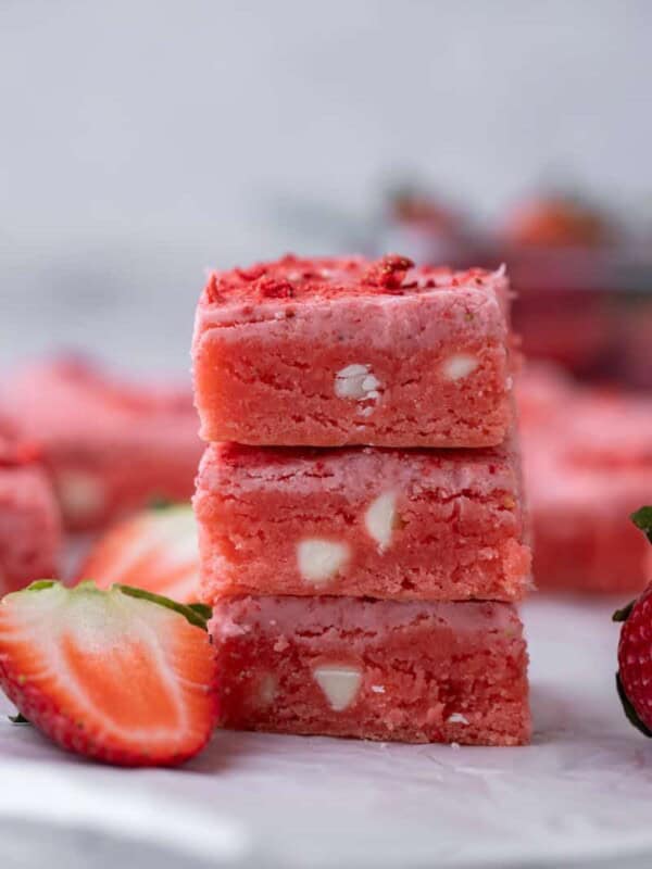 three strawberry brownies stacked on top of each other