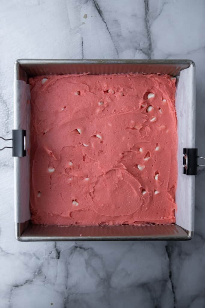 brownie batter in a prepared pan