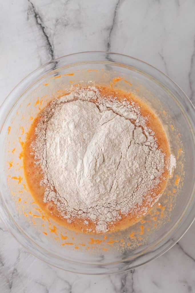 flour with batter in a clear bowl