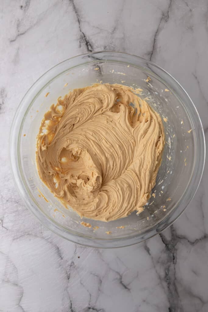finished recipe of how to make peanut butter frosting in a bowl