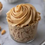 angled overhead shot of how to make peanut butter frosting in a cup