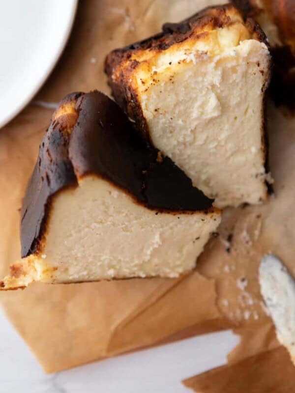 6-inch burnt basque cheesecake slices on parchment paper