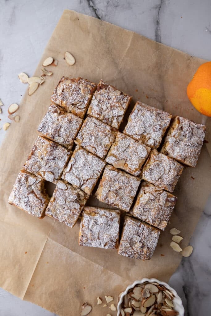 all of the almond croissant blondies cut into squares