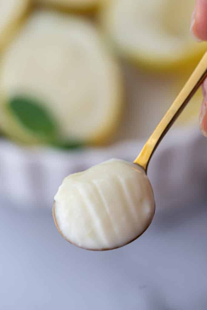 easy lemon posset recipe on a spoon
