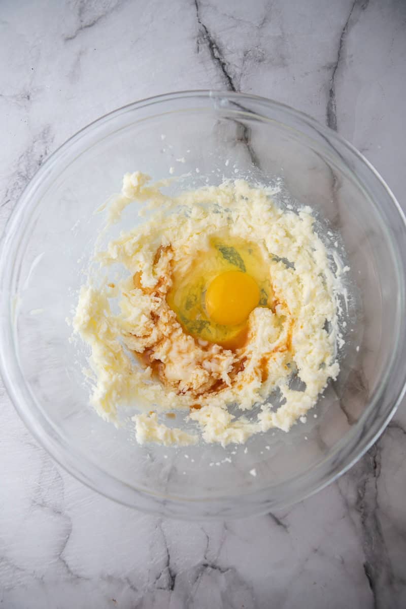Creamed butter and sugar in a mixing bowl for almond sugar cookies.