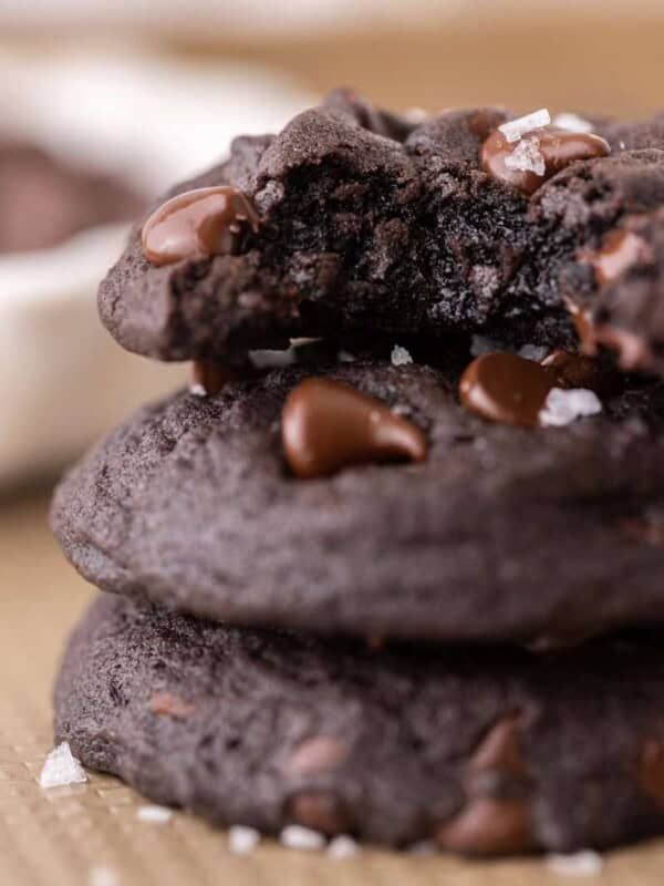 three Chocolate Chip Black Cocoa Cookies stacked on top of each other