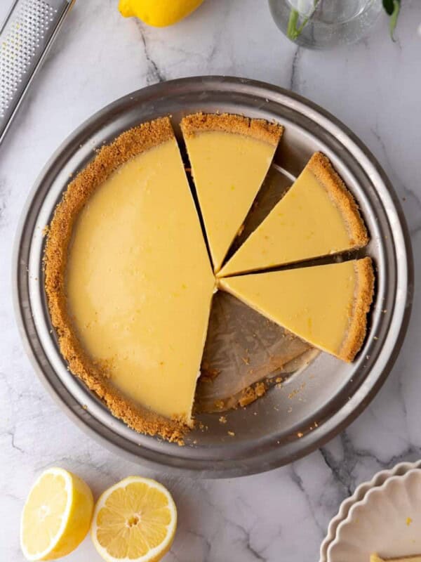a lemon pie with graham cracker crust in a pan