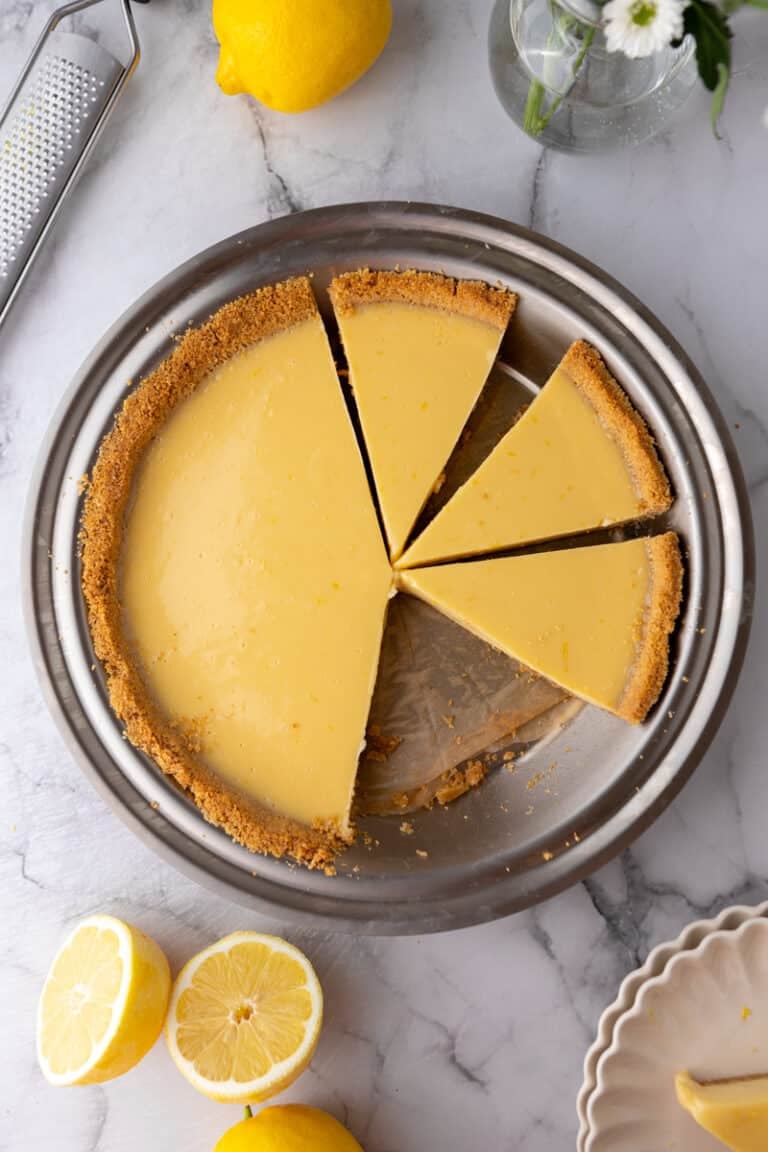 a lemon pie with graham cracker crust in a pan