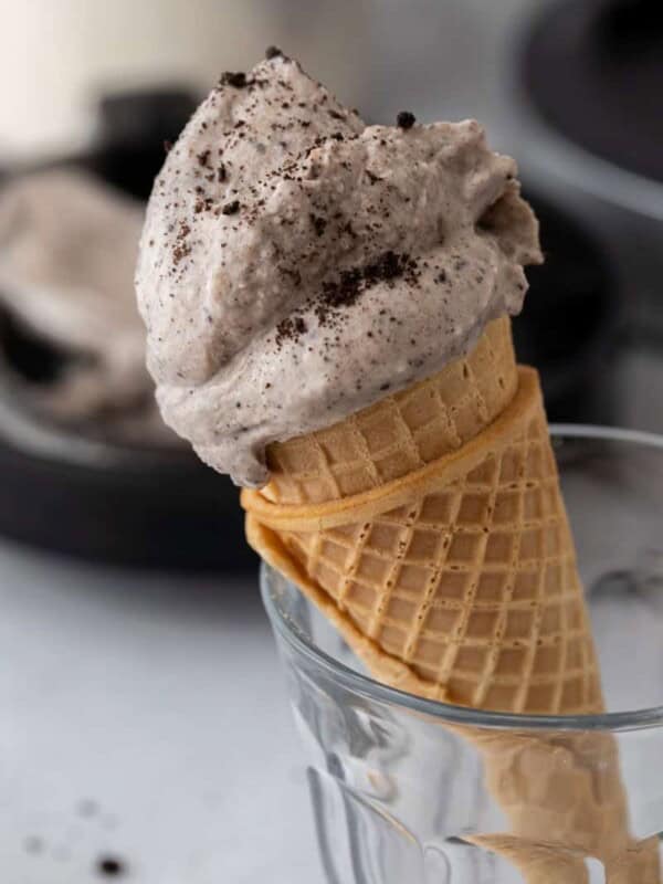 side shot of the ninja creami cookies and cream recipe on a cone